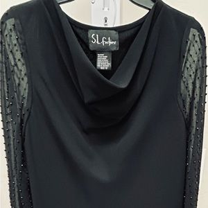 2 Piece Black/Beaded sleeve top. Long elastic waist pull on skirt. Size 12.